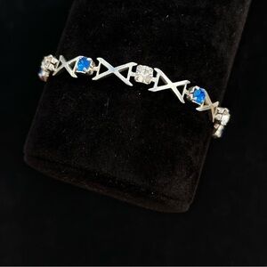 " X & O" Bracelet 925 Sterling Silver w/blue & clear rhinestones 6.75”
